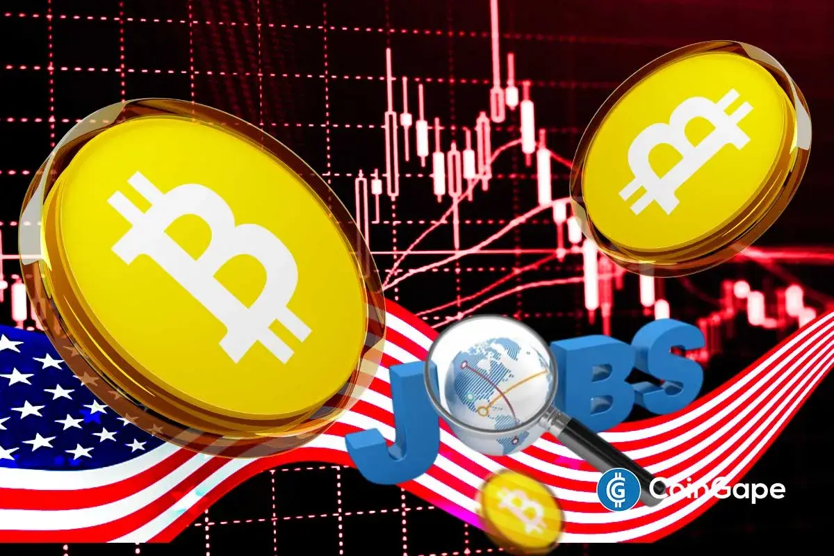 Moedas de Bitcoin ao lado da bandeira americana e da palavra "Jobs", com gráfico de velas vermelho ao fundo.