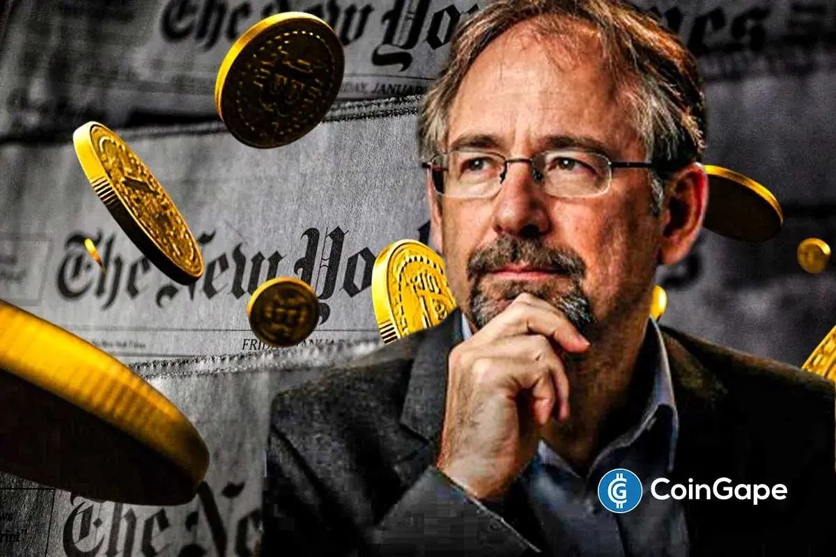 Homem pensativo em frente à capa do New York Times com moedas de Bitcoin ao redor.