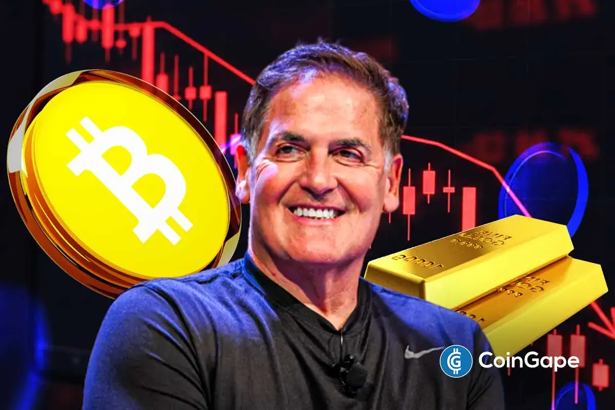 Mark Cuban segurando Bitcoin e barras de ouro com gráfico de queda ao fundo