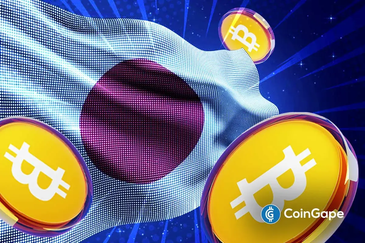 Moedas de bitcoin sobre a bandeira do Japão com fundo azul.